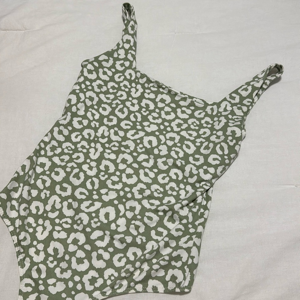Green cheetah body suit
